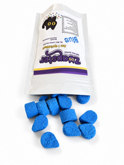 Zoapster Blue Bath Sprinkles pouch beside blue bath sprinkles.