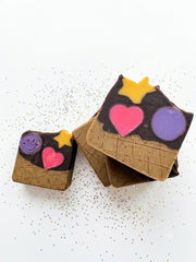 A Mini and a Biggi chocolate cone soap bar side by side, showing the size difference