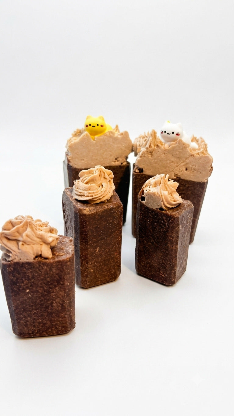 Three limited edition salty chocolate whipped soap bars with piped tops and cat toppers