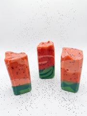 Three Mini watermelon soap bars sized for a child's hand